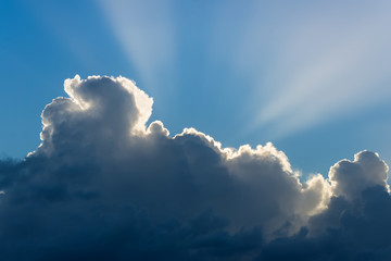 Sun rays from thunderclouds