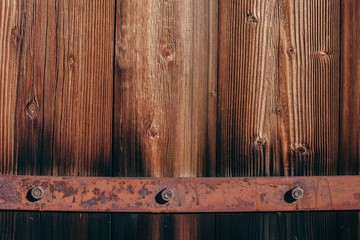 close-up shot of wooden planks and rusty metal framing for background