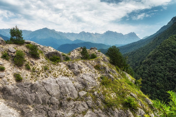 Fototapeta na wymiar Landscape with rocky mountains and cloudy sky