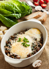 Baked eggs with mushrooms