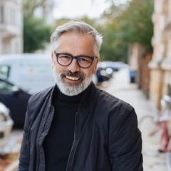 Attractive bearded man with lovely friendly smile