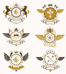 Vintage heraldry design templates, vector emblems created with bird wings, crowns, stars, armory and animal illustrations. Collection of vintage style symbols.