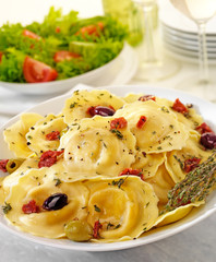 BOWL OF FIORELLI WITH SUNDRIED TOMATOES AND OLIVES