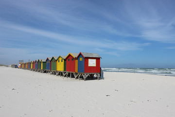 Colorful huts on Muizenberg Beach on warm summers day