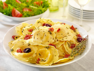 BOWL OF FIORELLI WITH SUNDRIED TOMATOES AND OLIVES