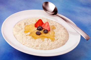 BOWL OF PORRIDGE ON BLUE