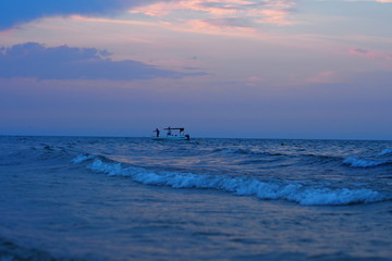 An evening by the sea. A boat and soft light 