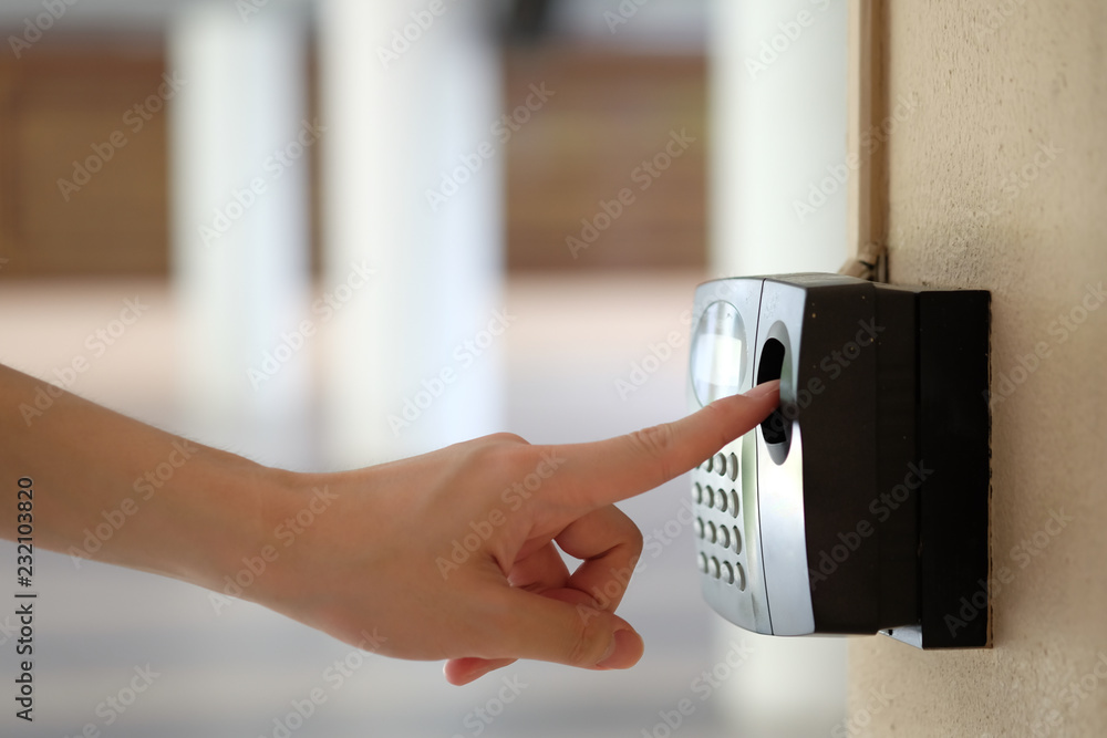 Poster a man touch to biometric fingerprint scanner. security, door access control, validation, cybersecuri