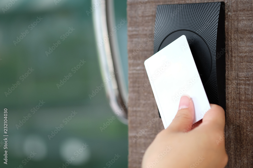 Fototapete door access control with a hand inserting keycard to unlock door. security, door access control, val