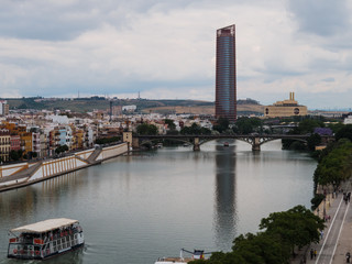 Fototapeta na wymiar Seville skyline with river Guadalquivir and tower
