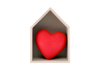 Wooden house with red heart isolated on white with clipping path