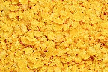 Corn-flakes background and texture. Top view. cornflake cereal box for morning breakfast.