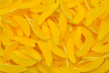 Yellow banana gummy candies. Top view. Jelly  sweets.