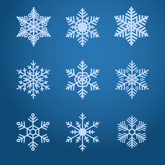 Vector snowflakes icons set on dark blue background.
