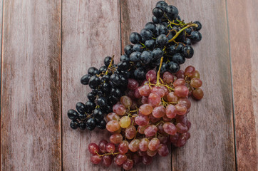 Blue grapes with green leaf healthy eating, isolated