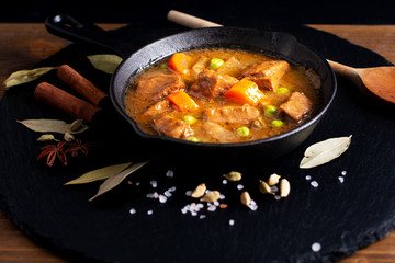 Winter Food concept homemade organic stew beef or bourguignon in Cast-Iron Skillet pan with copy space