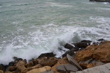 Sea rocks sand waves