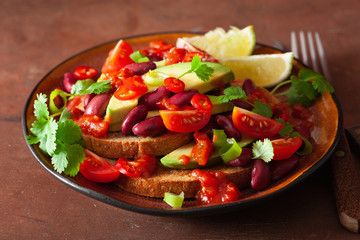 mexican avocado bean sandwich with tomato chili scallion