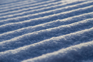 Snow on the roof of the house as a background
