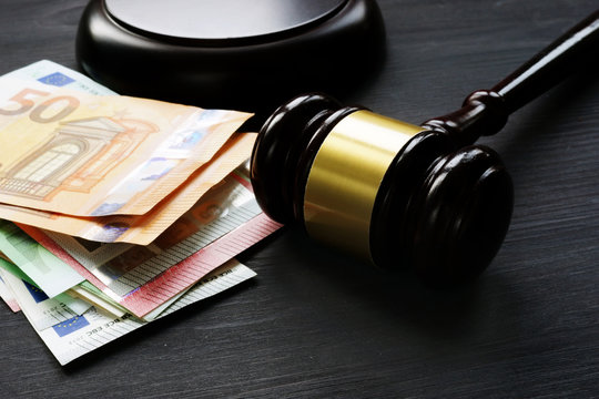 Gavel and euro banknotes. Bail bond or penalty in EU.