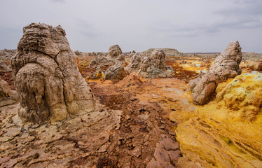 Dallol is an active volcanic crater in the Danakil Trench, Ethiopia. The volcano is known for its extraterrestrial landscapes resembling the surface of Io, the satellite of the planet Jupiter.