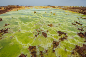 Dallol is an active volcanic crater in the Danakil Trench, Ethiopia. The volcano is known for its extraterrestrial landscapes resembling the surface of Io, the satellite of the planet Jupiter.