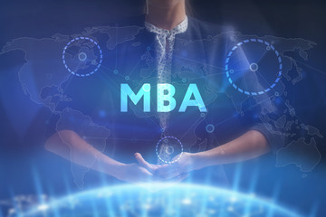 The concept of business, technology, the Internet and the network. A young entrepreneur working on a virtual screen of the future and sees the inscription: MBA