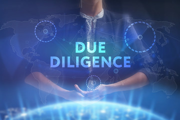 The concept of business, technology, the Internet and the network. A young entrepreneur working on a virtual screen of the future and sees the inscription: Due diligence