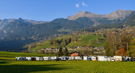Landscape with mountain village in autumn