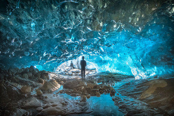illustrative image ice cave inside the mountain glacier Dombay, Karachay-Cherkess Republic,