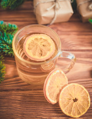 Christmas gift box, food decor and fir tree branch on wooden table. Top view with copy space
