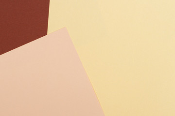 Color papers geometry composition background with beige and brown tones