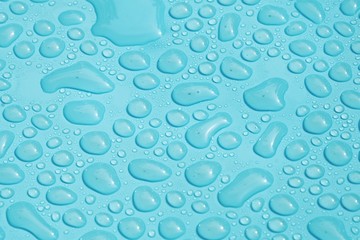 drops water on blue background