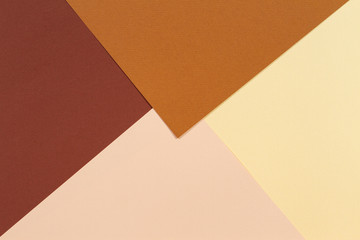 Abstract geometric paper texture cardboard background. Beige, brown yellow pastel trendy colors