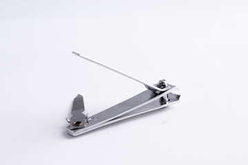 Metallic or silver nail cutter or clipper isolated on white background