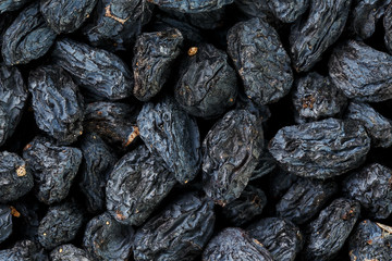 Black Raisin texture, popular dried fruit. Dried grapes.