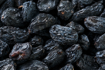 Black Raisin texture, popular dried fruit. Dried grapes.