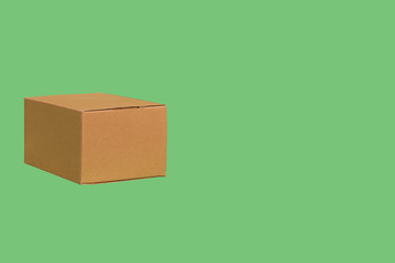 Separate box on a green background isolated