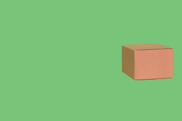 Separate box on a green background isolated