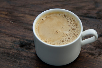 Hot latte on the beautiful nature background