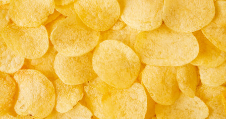 crispy potato chips snack texture background top view