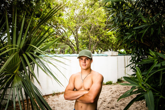 Portrait of a Young Man with Arms Crossed