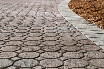 low angle brick paver driveway