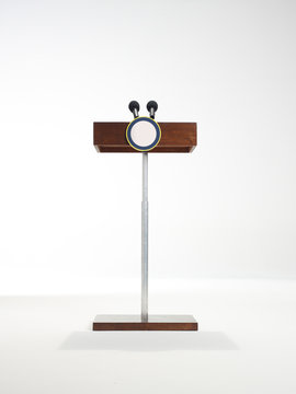 Tow microphones on a podium