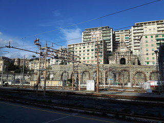  An amazing views of the pld station of Genoa in autumn with a great blue sky and some old parts of the city