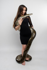 sensual woman and python