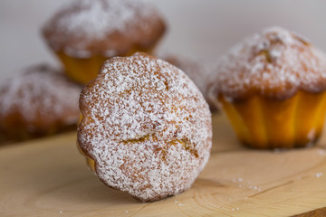 traditional muffins or baked basic cupcakes close up, selective focus