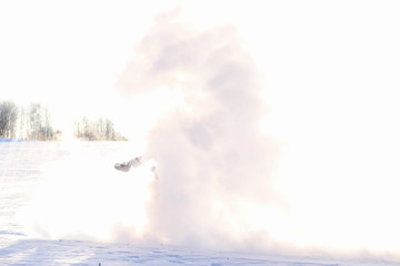 Santa in the winter field. Santa magical fog is walking along the field. Santa on Christmas Eve is carrying presents to children in a red bag.