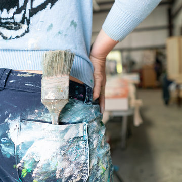 Paintbrush in Woman's Pocket