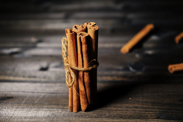 Cinnamon sticks on dark background